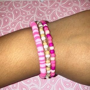 2 pink bracelets. One beach vibes.